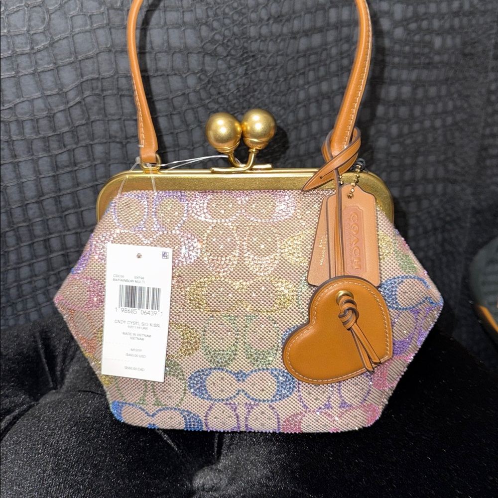 Coach Kisslock Frame Bag 16
In Crystal Signature Jacquard